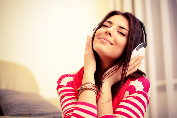 Happy woman listening to music Happy woman listening to music