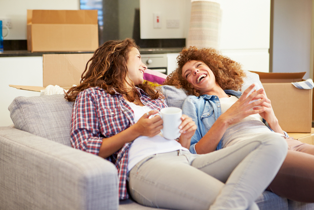 Happy friends in a new apartment Happy friends in a new apartment