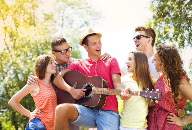 Group of friends singing together Group of friends singing together