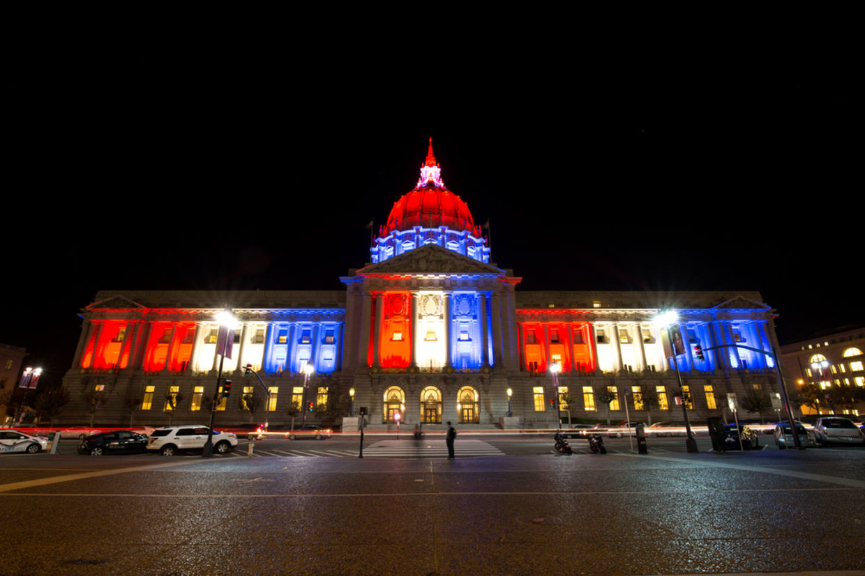 The San Fransisco City Hall glows red white and blue in solidarity with Paris The San Fransisco City Hall glows red white and blue in solidarity with Paris