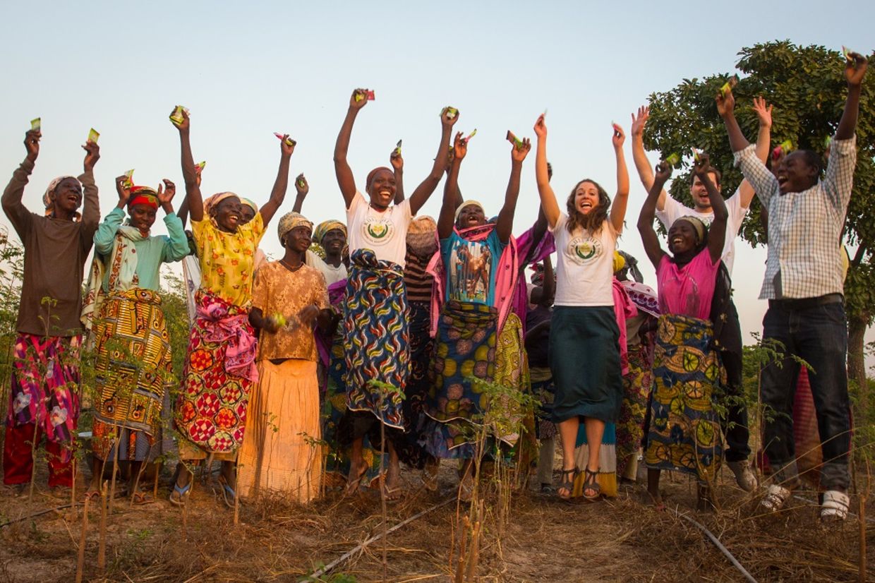 Kuli Kuli founder Lisa Curtis celebrates with female farmers in Nigeria. Kuli Kuli founder Lisa Curtis celebrates with female farmers in Nigeria.