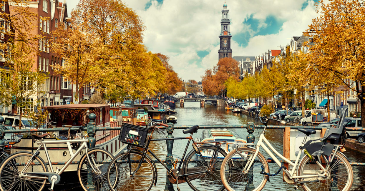 Bicycles stand on a bridge in Amsterdam Bicycles stand on a bridge in Amsterdam