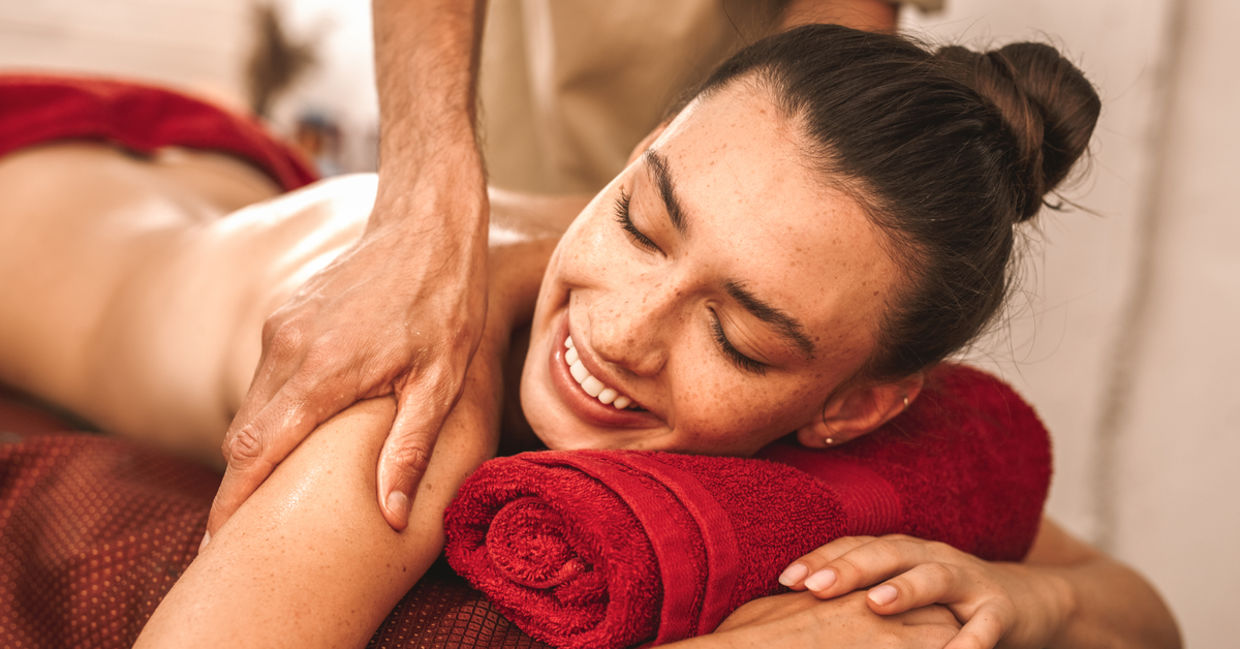 Woman getting an Abhyanga massage. Woman getting an Abhyanga massage.