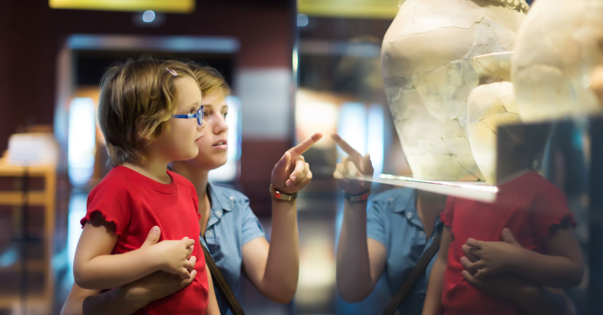 Mother and daughter at a history museum. Mother and daughter at a history museum.