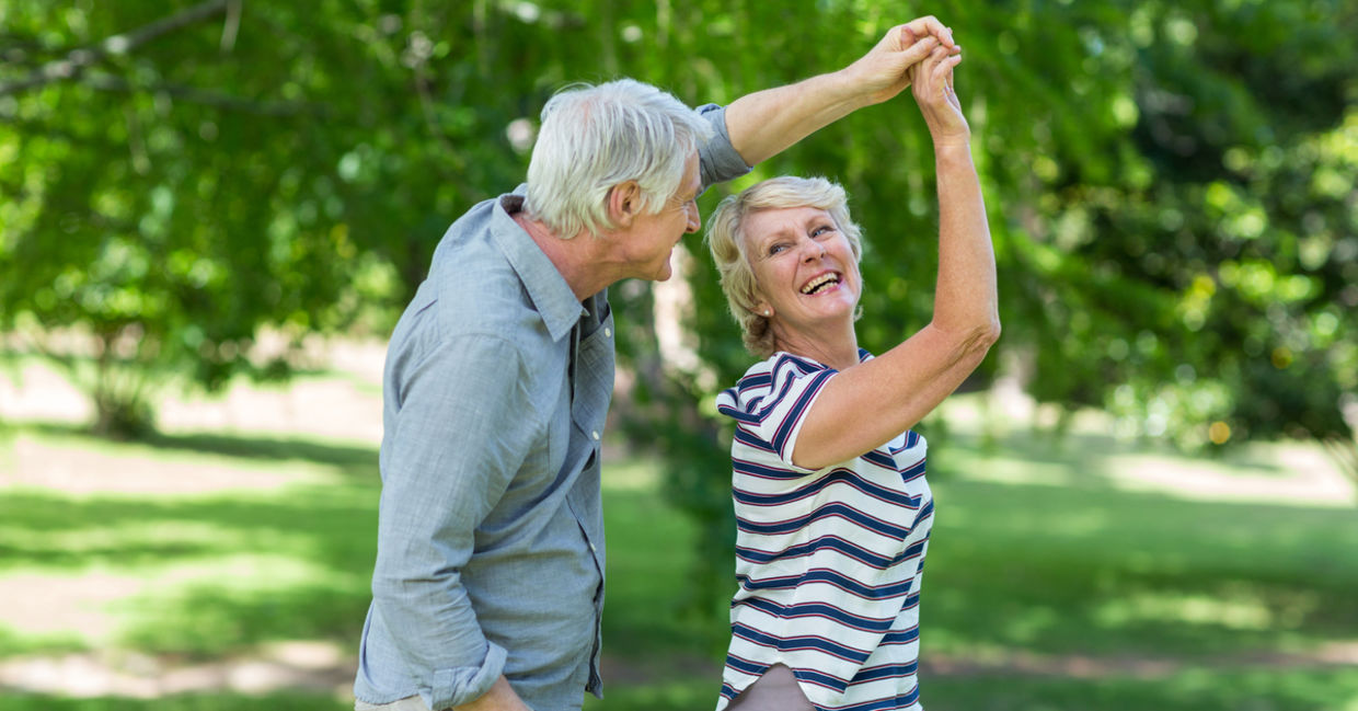 Happy seniors in a park. Happy seniors in a park.