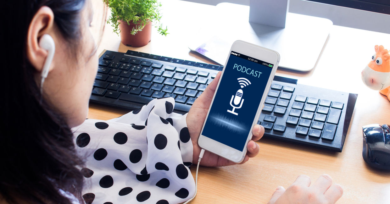 Woman listening to podcast Woman listening to podcast