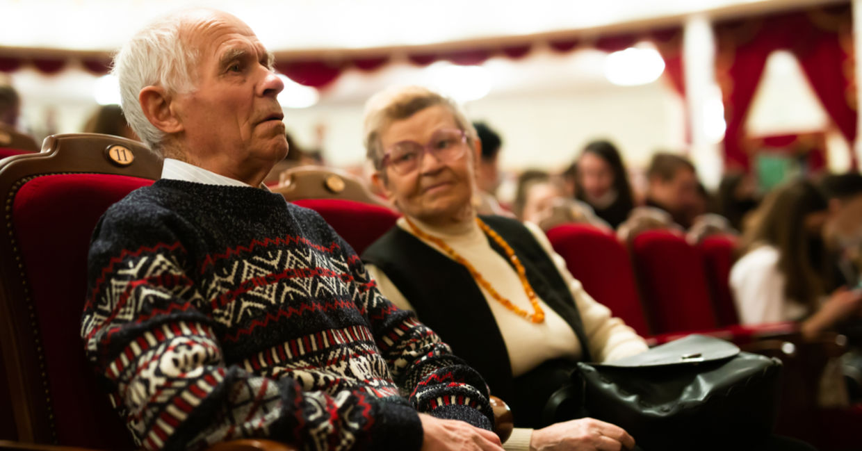 Senior couple enjoying performance at opera and ballet theater. Senior couple enjoying performance at opera and ballet theater.