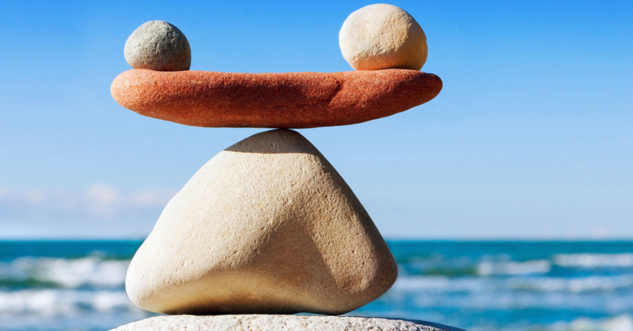 Stones carefully placed one atop another represent clarity and balance. Stones carefully placed one atop another represent clarity and balance.