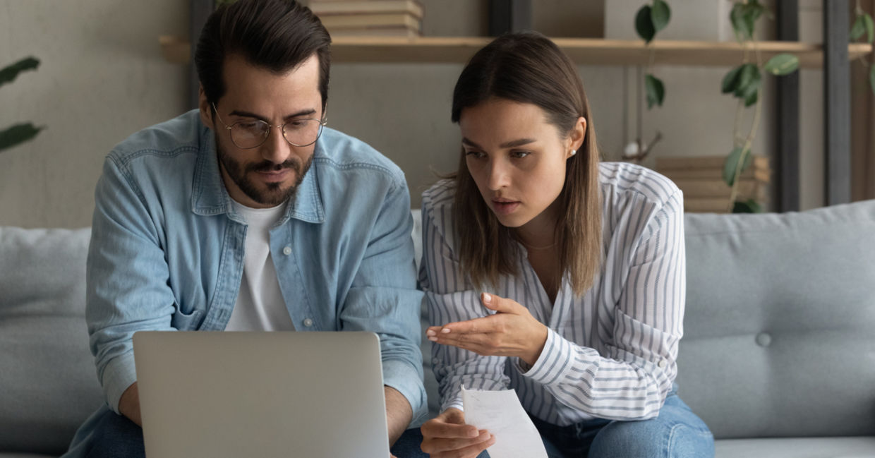 Couple discuss finance as equals Couple discuss finance as equals