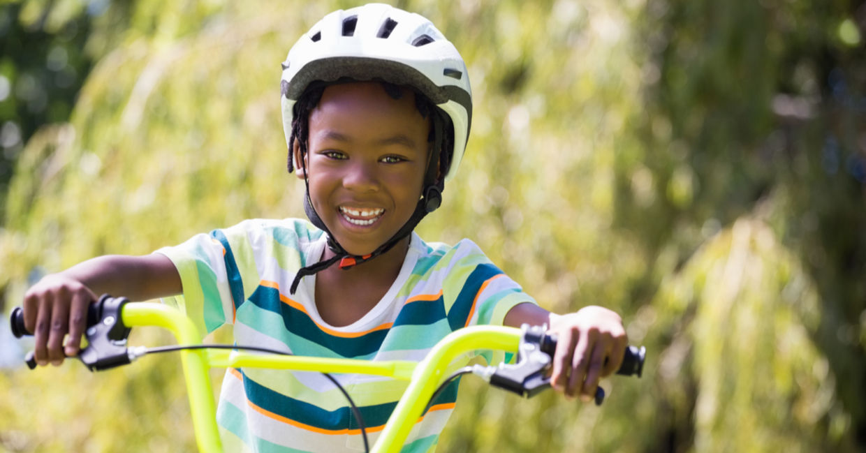 Kid riding a bike. Kid riding a bike.