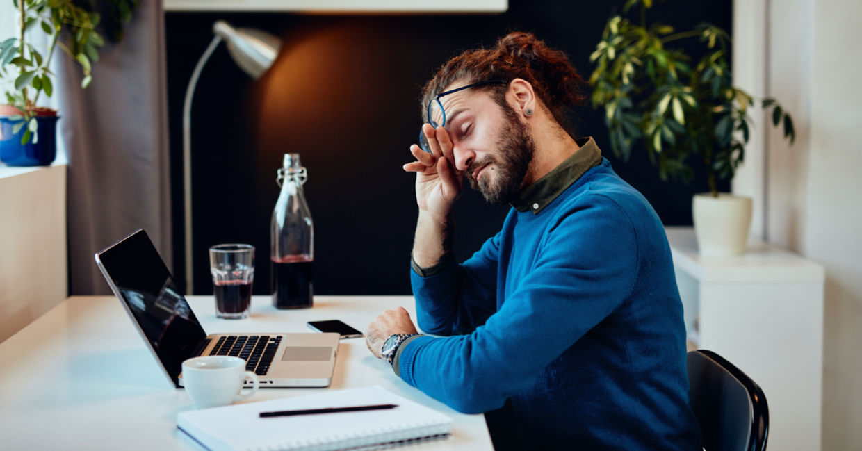 Man resting eyes to prevent eyestrain. Man resting eyes to prevent eyestrain.
