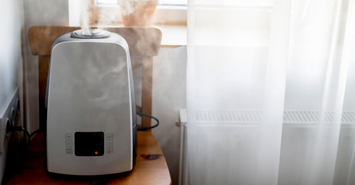 Home humidifier near the window Home humidifier near the window