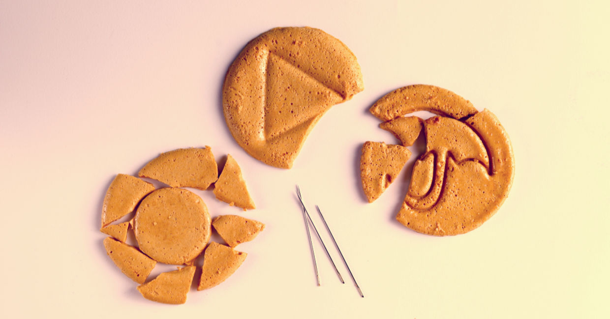 Korean popgi candy, honeycomb toffee sugar candy with umbrella and triangle shapes. Korean popgi candy, honeycomb toffee sugar candy with umbrella and triangle shapes.