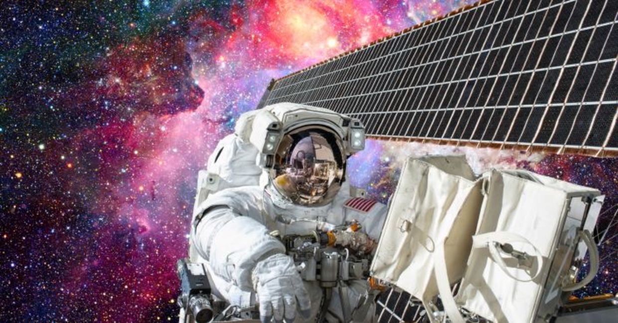 Working outside the International Space Station. Working outside the International Space Station.
