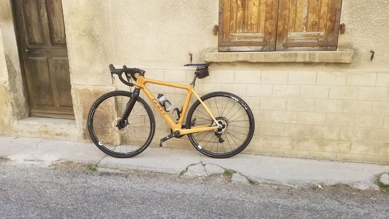 This bicycle is made of wood. This bicycle is made of wood.