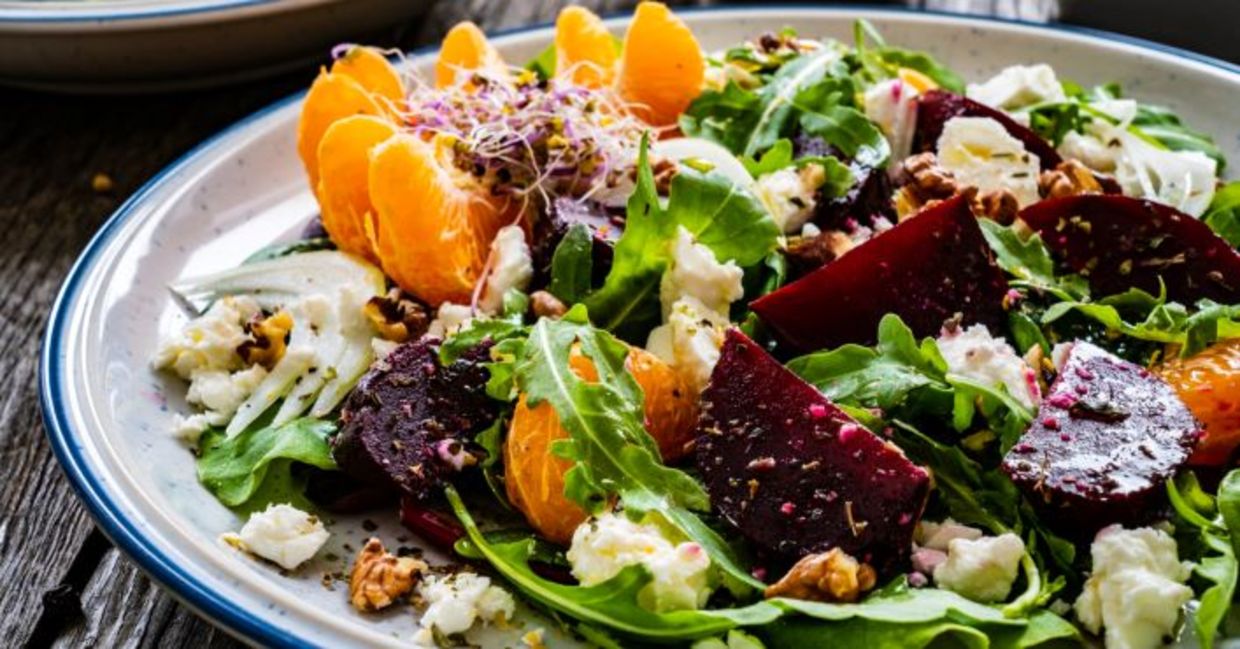 Salad with beets, walnuts, feta cheese and mandarins. Salad with beets, walnuts, feta cheese and mandarins.
