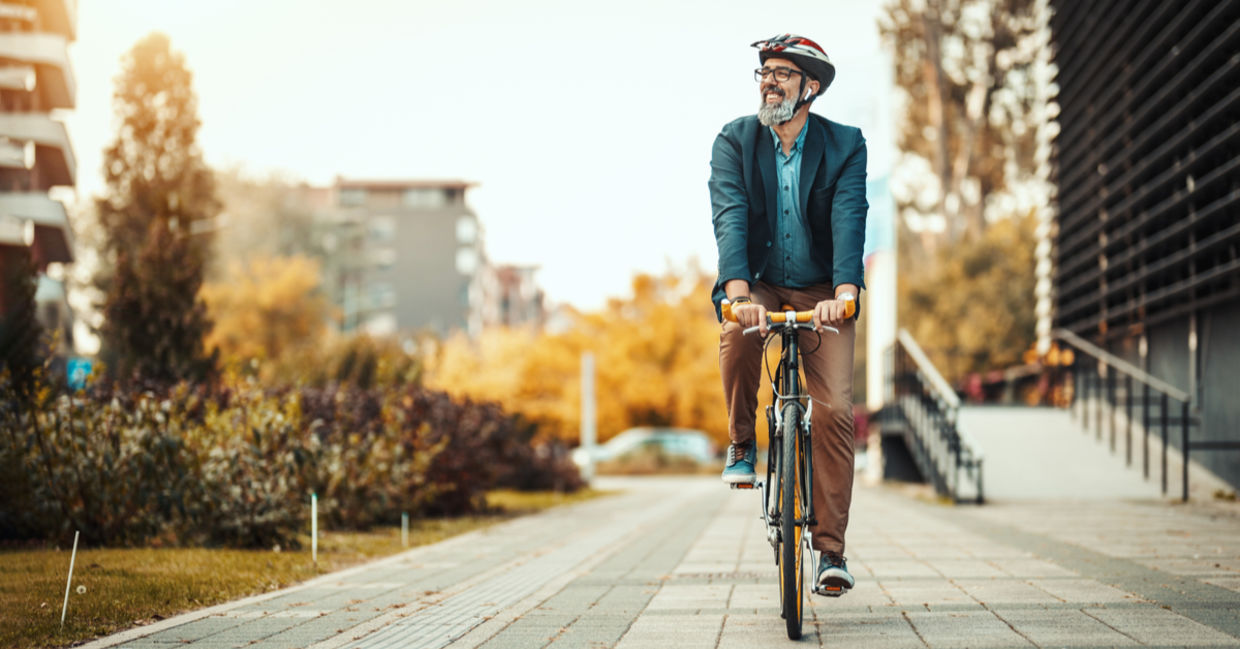 a man on a bicycle. a man on a bicycle.