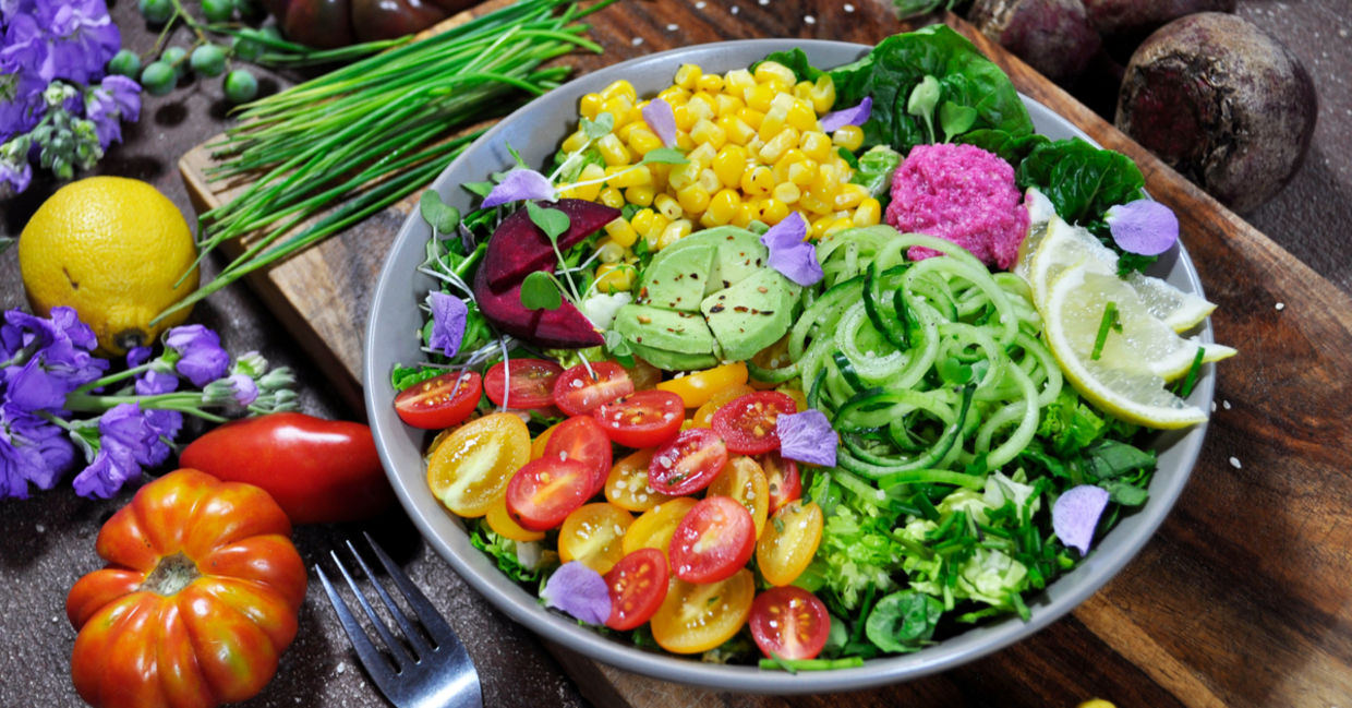 A rainbow salad showcasing plant-based food. A rainbow salad showcasing plant-based food.