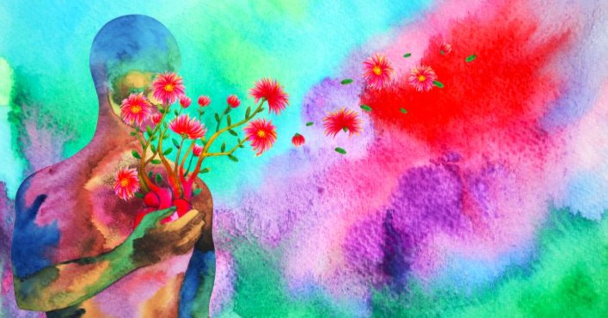 Compassion expressed in a watercolor painting of a human red heart healing flower. Compassion expressed in a watercolor painting of a human red heart healing flower.