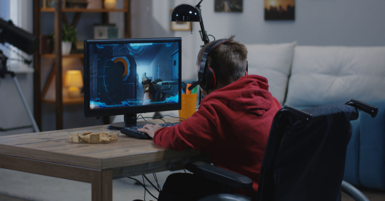 A child plays a video game. A child plays a video game.