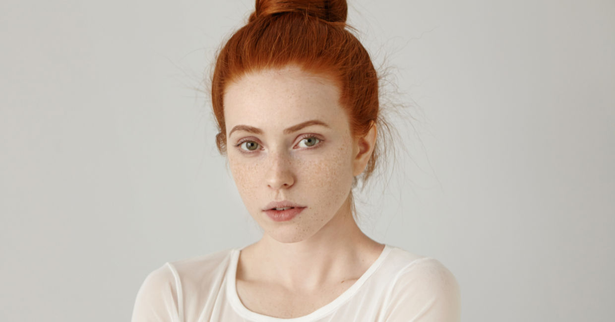 A portrait of a redhead woman. A portrait of a redhead woman.