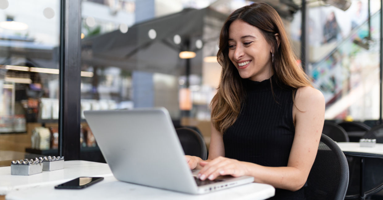 A young woman typing. A young woman typing.