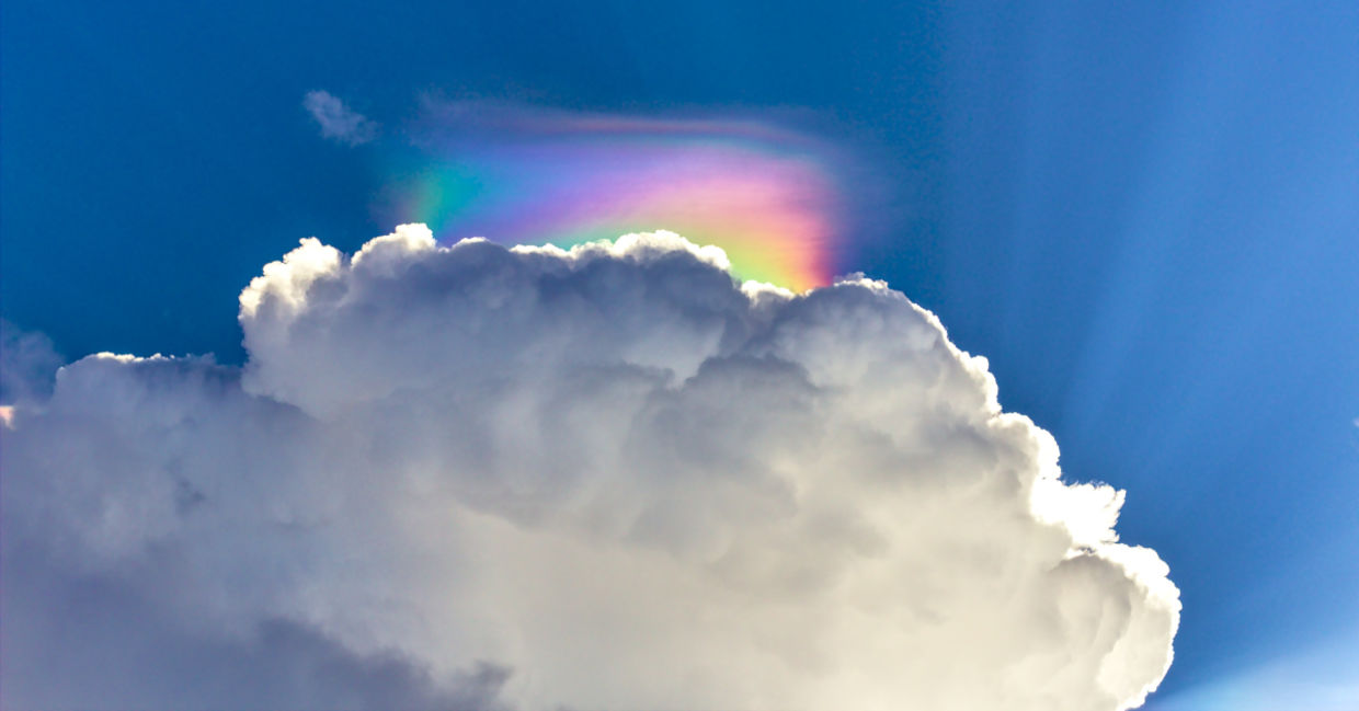 A rare cloud phenomenon called Iridescent Cloud also known as Fire Rainbow. A rare cloud phenomenon called Iridescent Cloud also known as Fire Rainbow.