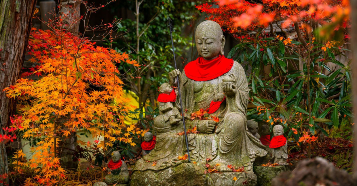 Jizo statue in autumn garden of Sanboin Temple on Mount Koyasan. Jizo statue in autumn garden of Sanboin Temple on Mount Koyasan.