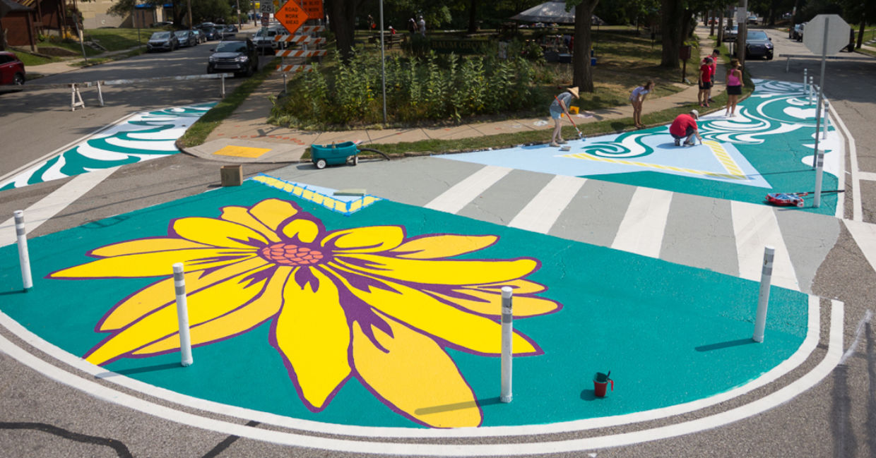 Artists and volunteers paint a colorful intersection in Pittsburgh, PA. Artists and volunteers paint a colorful intersection in Pittsburgh, PA.