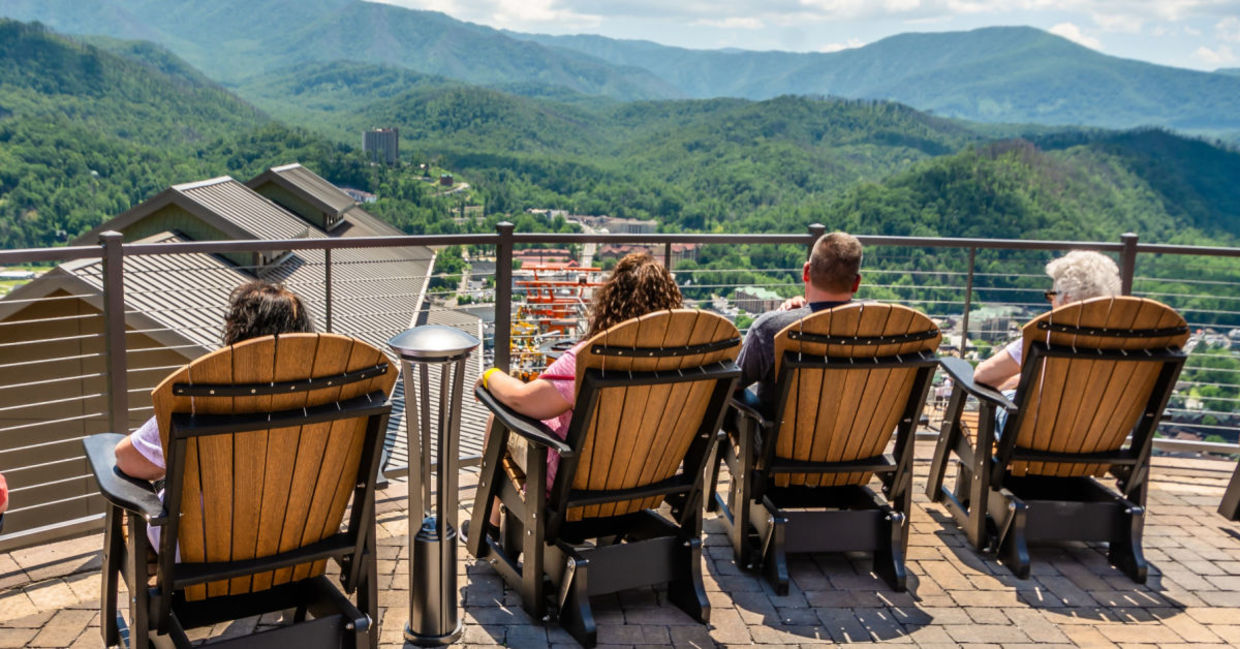 A family enjoys a view of Great Smoky Mountain from the Skydeck in Gatlinburg, Tennessee. A family enjoys a view of Great Smoky Mountain from the Skydeck in Gatlinburg, Tennessee.