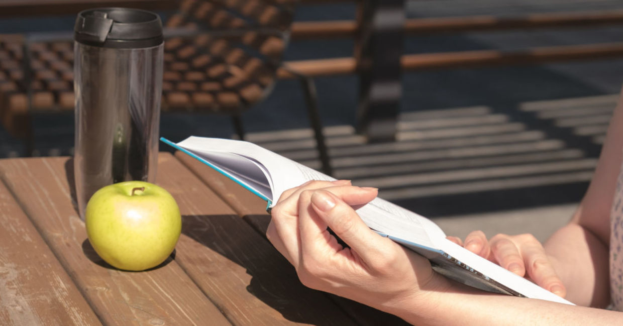 Read a book to relax on your lunch break. Read a book to relax on your lunch break.
