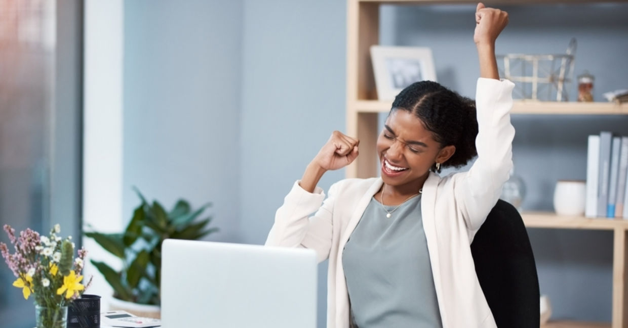 Happy businesswomen in her customized office. Happy businesswomen in her customized office.
