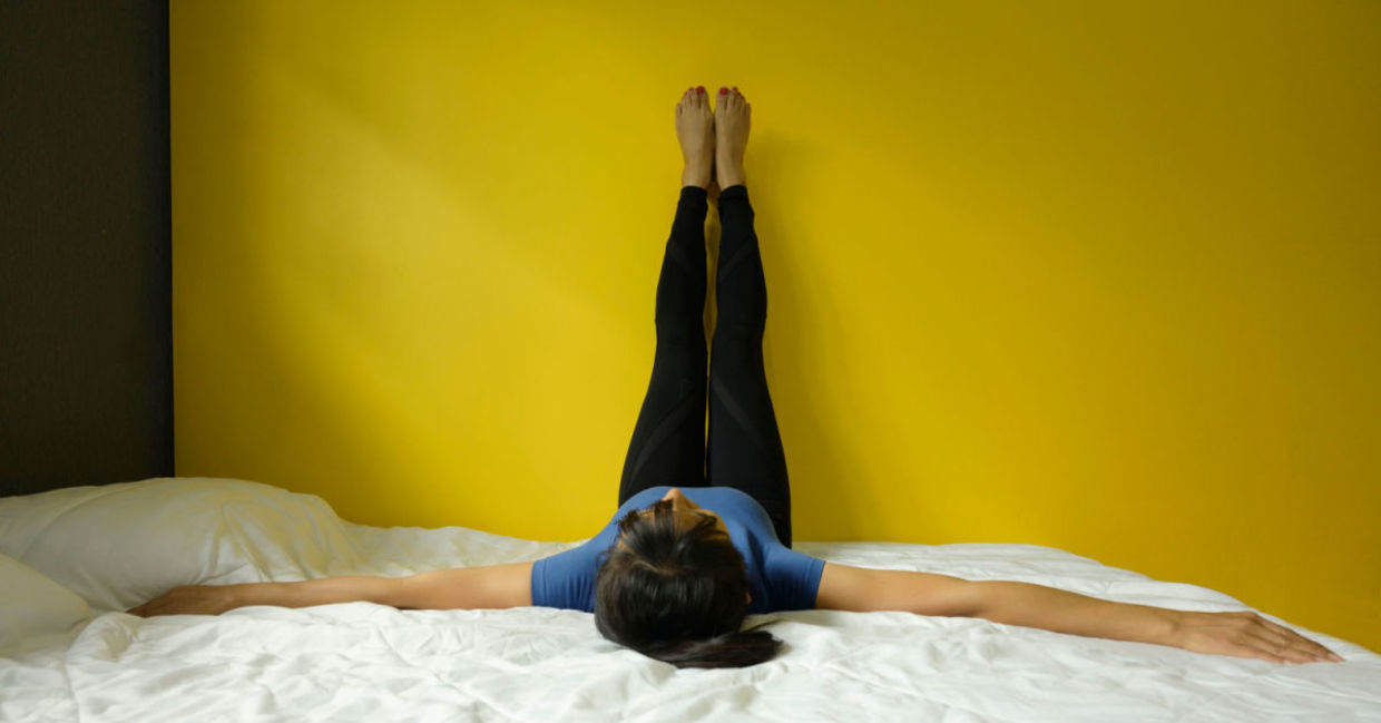 Stretch with the legs up the wall pose. Stretch with the legs up the wall pose.
