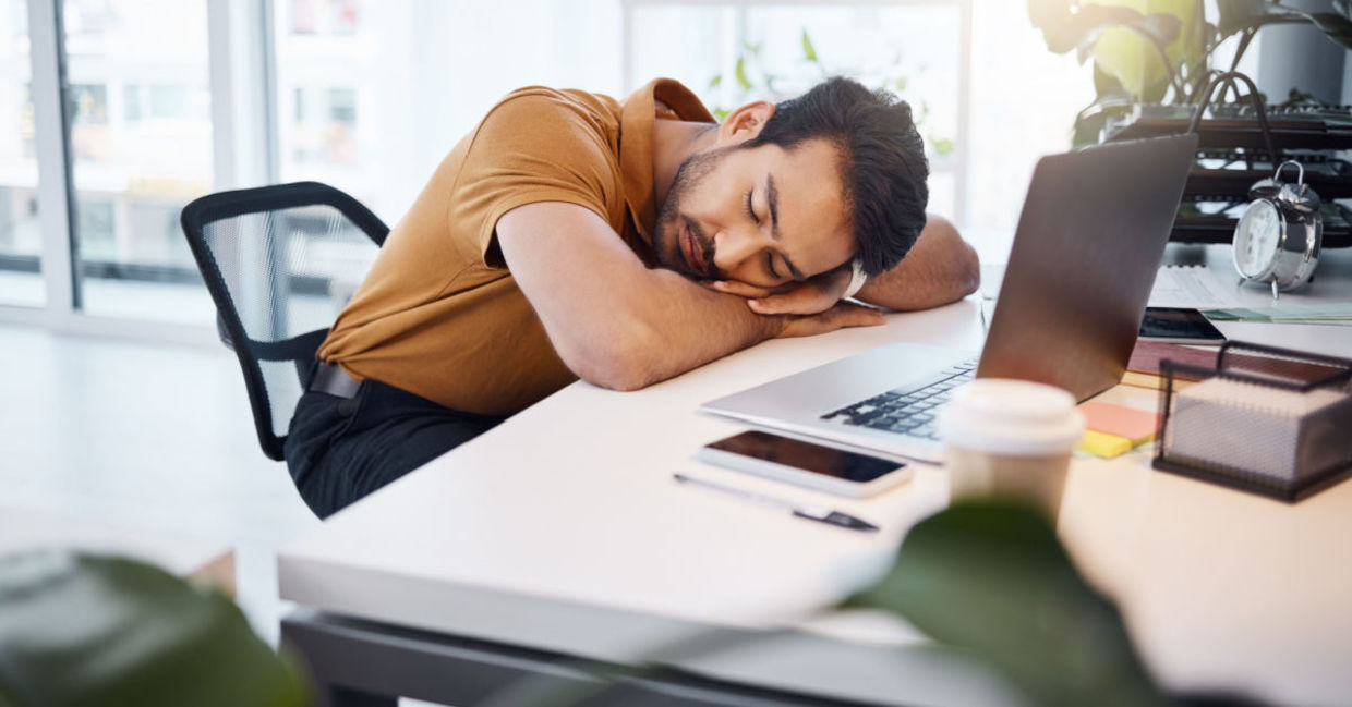 Taking a nap at work. Taking a nap at work.
