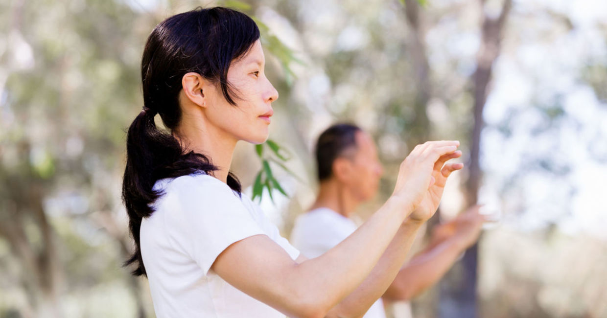 Woman practicing tai chi. Woman practicing tai chi.