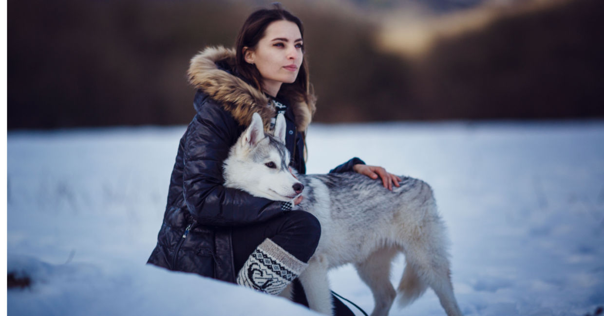 Indigenous woman with her dog companion. Indigenous woman with her dog companion.