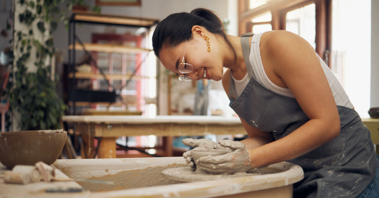 Potter working in clay or ceramics Potter working in clay or ceramics