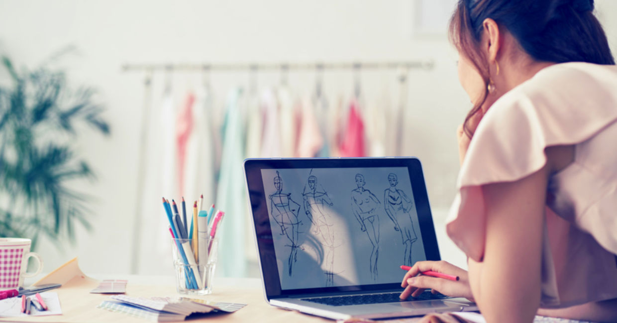 Fashion designer drawing sketches for new collection. Fashion designer drawing sketches for new collection.