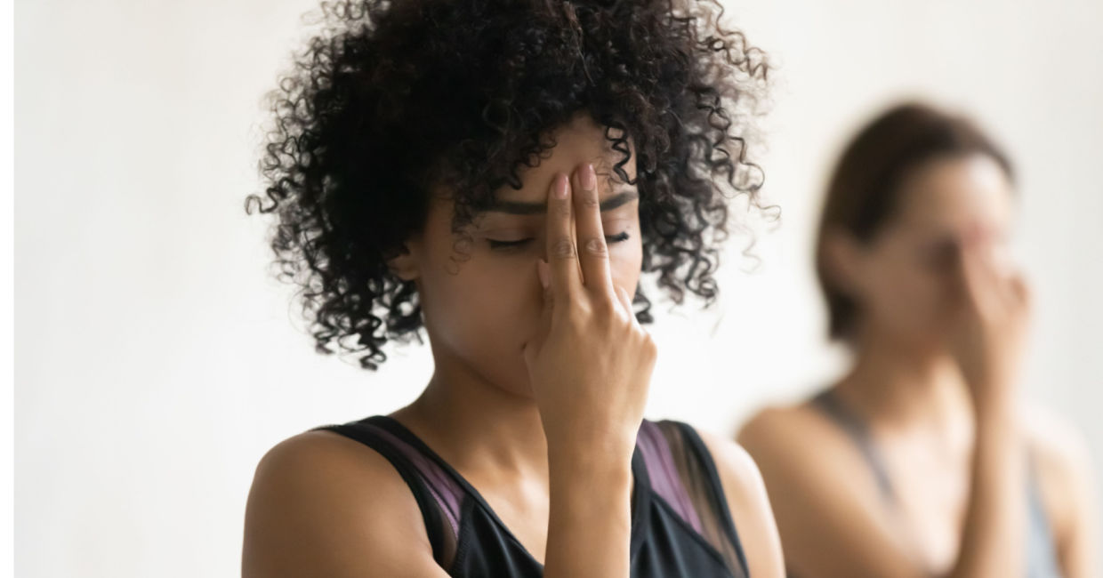 Women practicing pranayama deep breathing. Women practicing pranayama deep breathing.