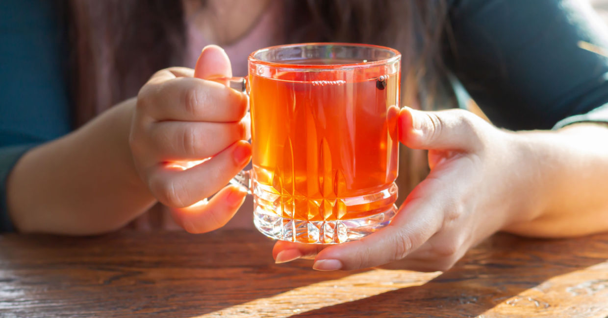 Enjoying a healthy cup of kombucha tea. Enjoying a healthy cup of kombucha tea.