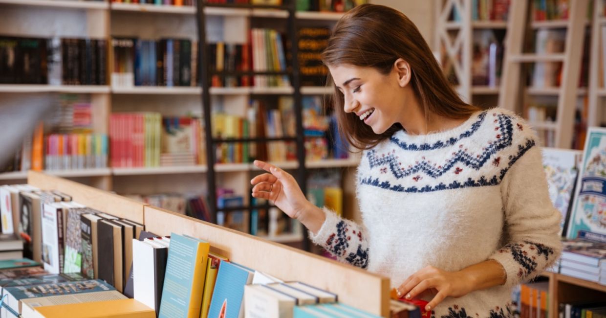 Choosing a book at a community bookseller. Choosing a book at a community bookseller.