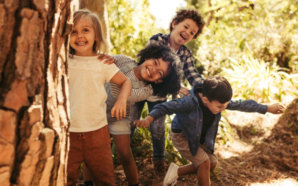 Children playing outside in nature. Children playing outside in nature.
