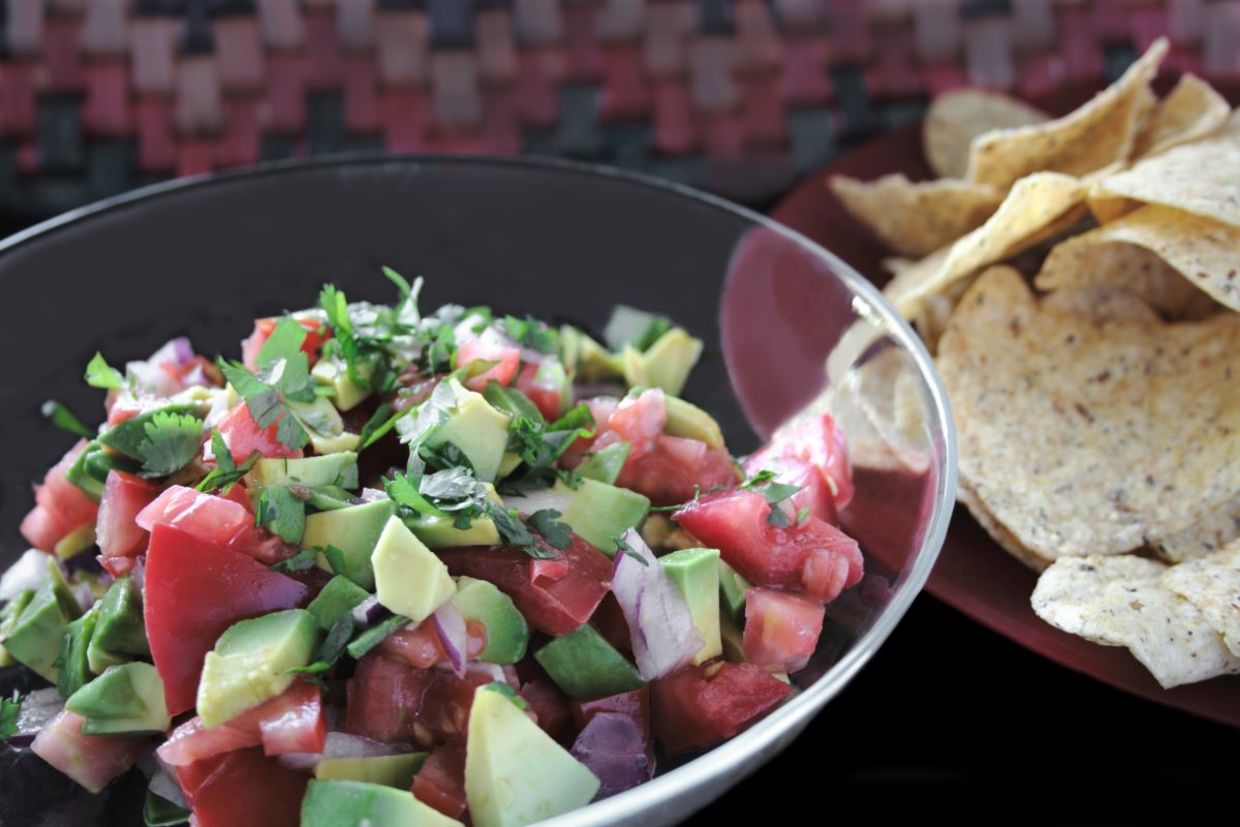 Add avocado to salsa for a healthy treat. Add avocado to salsa for a healthy treat.