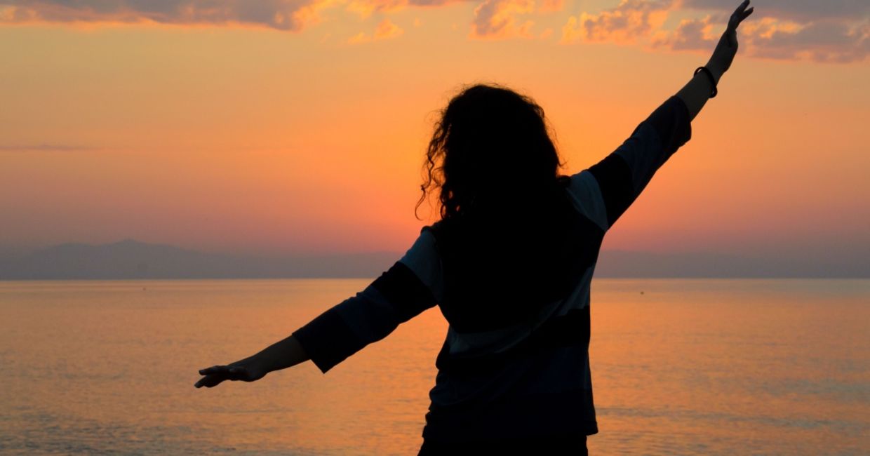 Woman enjoying the sunrise. Woman enjoying the sunrise.