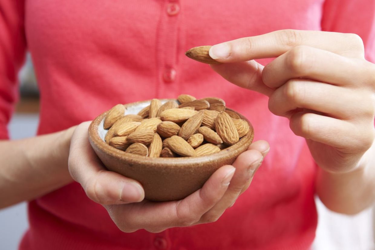 Eating almonds could help you sleep better. Eating almonds could help you sleep better.