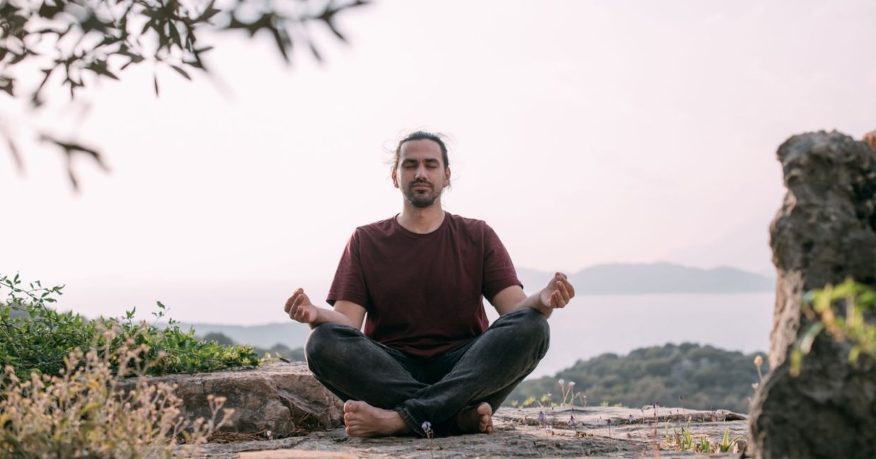 Man meditating in nature. Man meditating in nature.